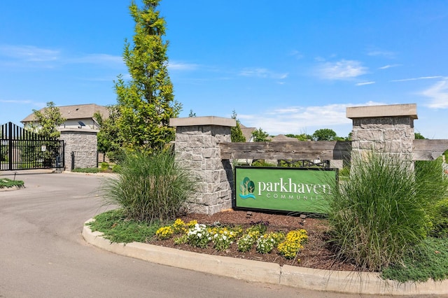 community sign with a gate