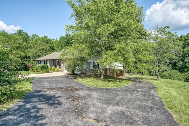 5651 S York Hwy, Grimsley, TN 38565 - view of front of home featuring aphalt driveway and a front lawn
