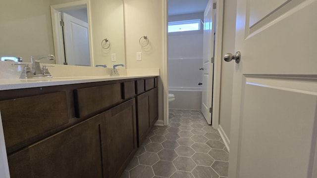 6139 Saxlingham Pl, Smyrna, TN 37167 - bathroom featuring double vanity, a bath, tile patterned flooring, walk in shower, and toilet