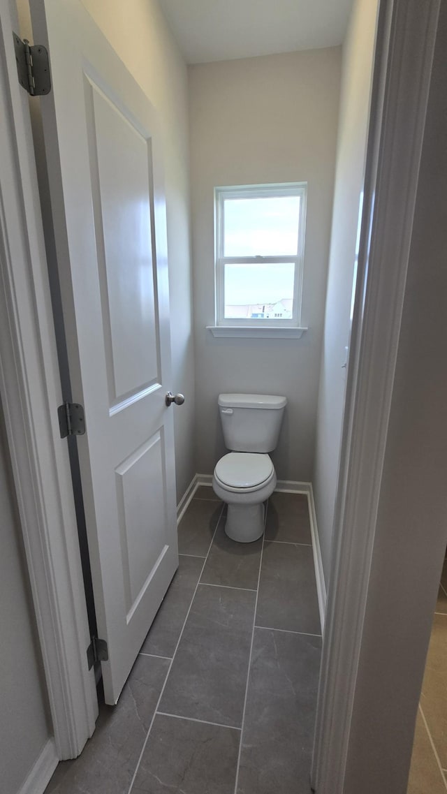 6139 Saxlingham Pl, Smyrna, TN 37167 - bathroom with toilet, tile patterned floors, and baseboards
