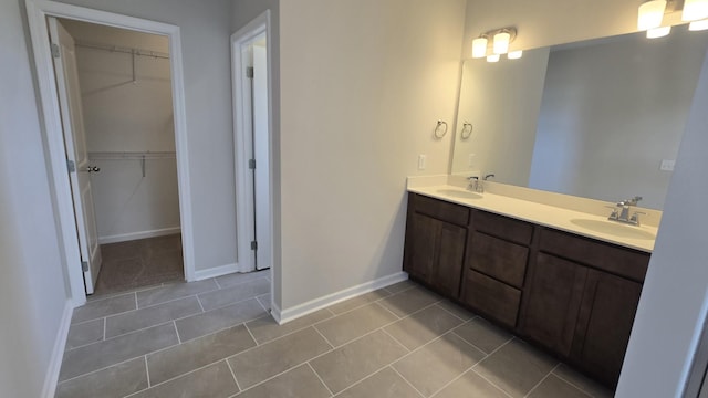 6139 Saxlingham Pl, Smyrna, TN 37167 - full bath featuring a sink, tile patterned floors, and a spacious closet