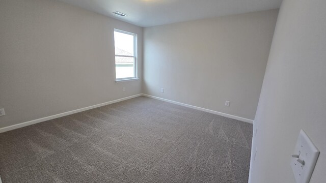 6139 Saxlingham Pl, Smyrna, TN 37167 - carpeted empty room with baseboards and visible vents
