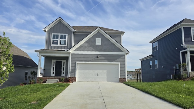 6141 Saxlingham Pl, Smyrna, TN 37167 - craftsman house featuring board and batten siding, a porch, driveway, and a front yard
