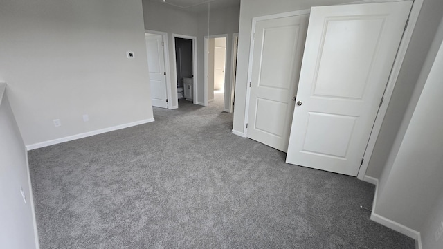 6141 Saxlingham Pl, Smyrna, TN 37167 - unfurnished bedroom featuring baseboards, carpet, and attic access