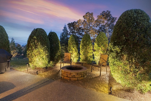 1019 Club View Dr, Gallatin, TN 37066 - patio terrace at dusk with an outdoor fire pit