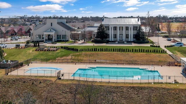 1019 Club View Dr, Gallatin, TN 37066 - exterior space featuring metal roof, fence, a fenced in pool, and a residential view