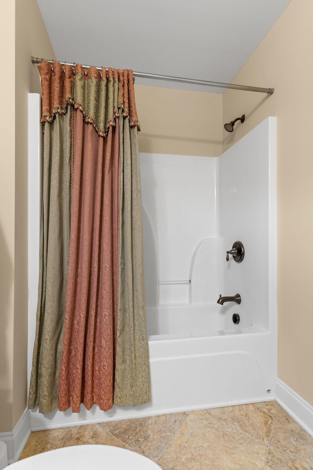 1019 Club View Dr, Gallatin, TN 37066 - full bath with toilet, shower / bath combo with shower curtain, and baseboards