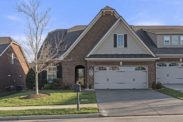 1019 Club View Dr, Gallatin, TN 37066 - view of front of property with concrete driveway, brick siding, a front lawn, a shingled roof, and a garage
