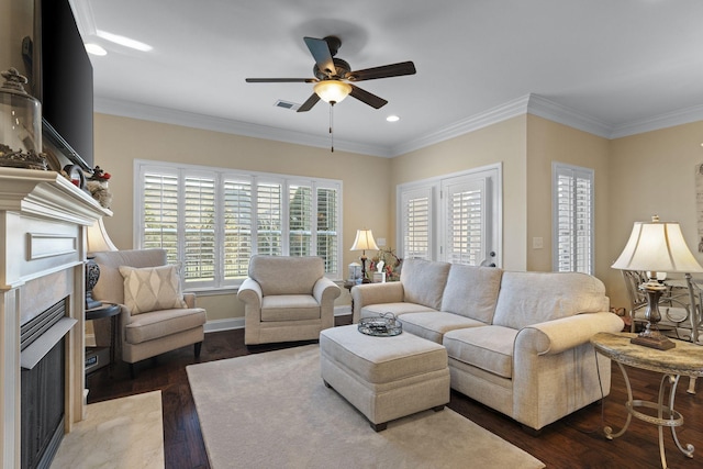 1019 Club View Dr, Gallatin, TN 37066 - living room featuring crown molding, a premium fireplace, ceiling fan, visible vents, and wood finished floors