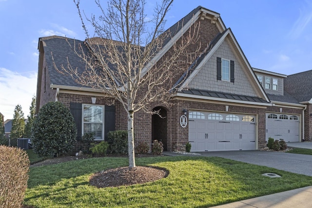 1019 Club View Dr, Gallatin, TN 37066 - view of front facade featuring a front lawn, driveway, a shingled roof, and brick siding