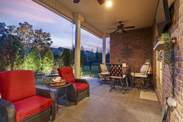 1019 Club View Dr, Gallatin, TN 37066 - view of patio / terrace with fence, outdoor dining area, ceiling fan, and an outdoor living space with a fire pit