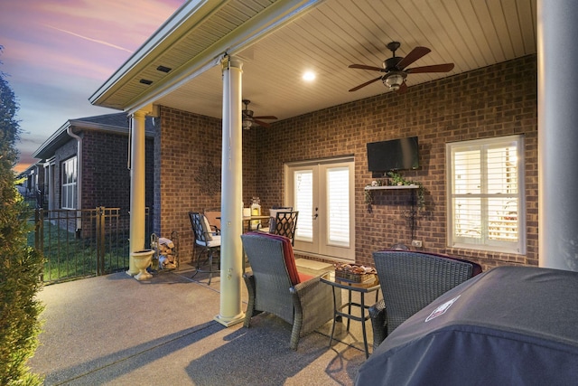 1019 Club View Dr, Gallatin, TN 37066 - patio terrace at dusk featuring french doors and ceiling fan