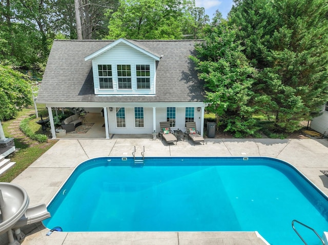 pool featuring a patio area