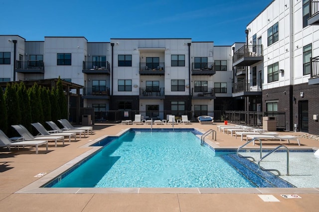 1638 54th Ave N Unit 313, Nashville, TN 37209 - community pool featuring a patio area and fence