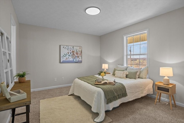 650 Wall Rd, Cunningham, TN 37052 - carpeted bedroom with baseboards and a textured ceiling