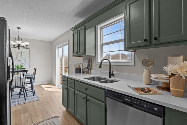 650 Wall Rd, Cunningham, TN 37052 - kitchen featuring green cabinets, a sink, dishwasher, and black fridge
