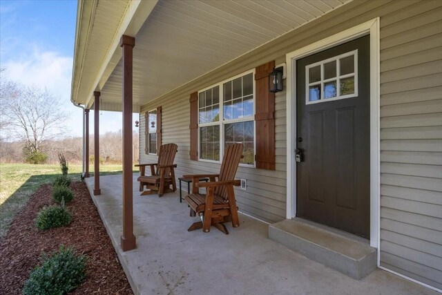 650 Wall Rd, Cunningham, TN 37052 - view of exterior entry with a porch