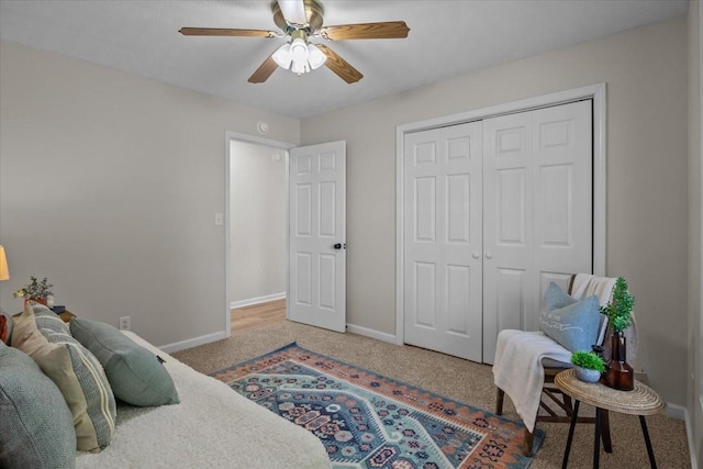 650 Wall Rd, Cunningham, TN 37052 - carpeted bedroom with baseboards, a closet, and ceiling fan