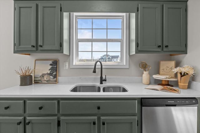 650 Wall Rd, Cunningham, TN 37052 - kitchen with stainless steel dishwasher, green cabinetry, light countertops, and a sink