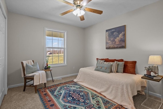650 Wall Rd, Cunningham, TN 37052 - carpeted bedroom with baseboards and ceiling fan