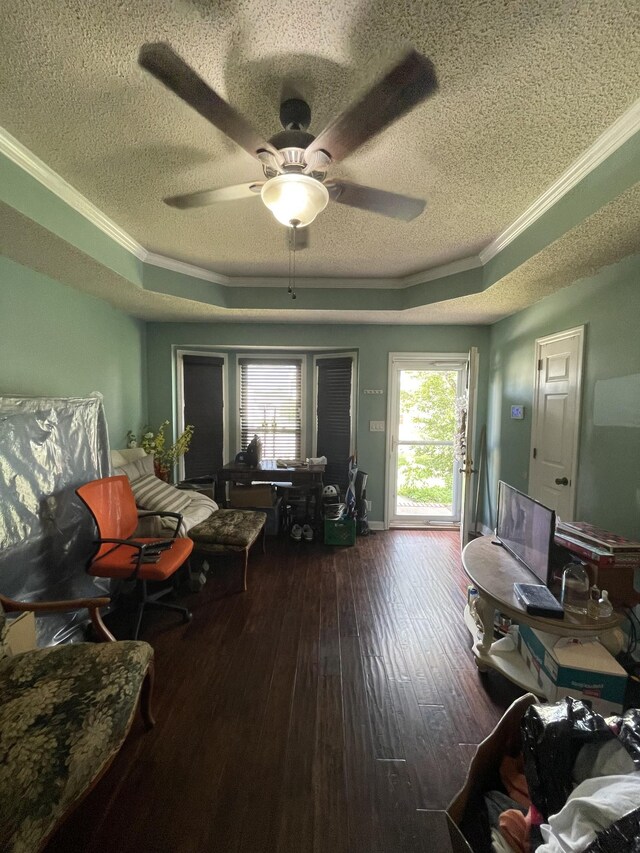 1222 Marla Dr, Clarksville, TN 37042 - living area featuring ornamental molding, a textured ceiling, a raised ceiling, hardwood / wood-style flooring, and a ceiling fan