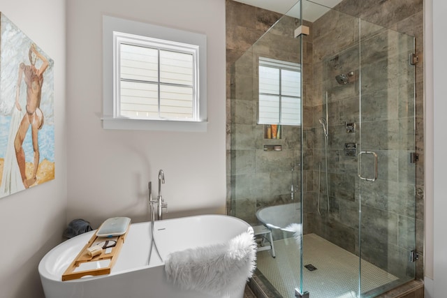 128 37th Ave N, Nashville, TN 37209 - bathroom featuring a freestanding bath and a stall shower