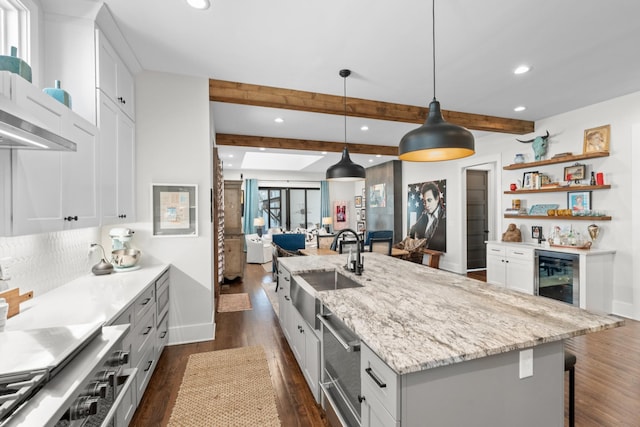 128 37th Ave N, Nashville, TN 37209 - kitchen with wine cooler, a large island with sink, recessed lighting, and a sink