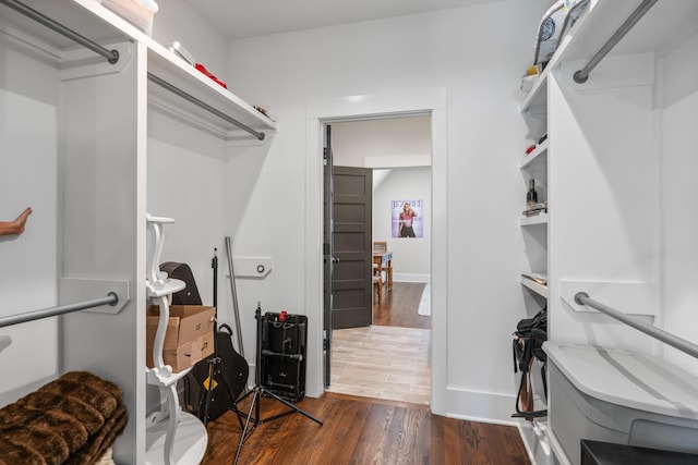 128 37th Ave N, Nashville, TN 37209 - spacious closet with dark wood-style flooring