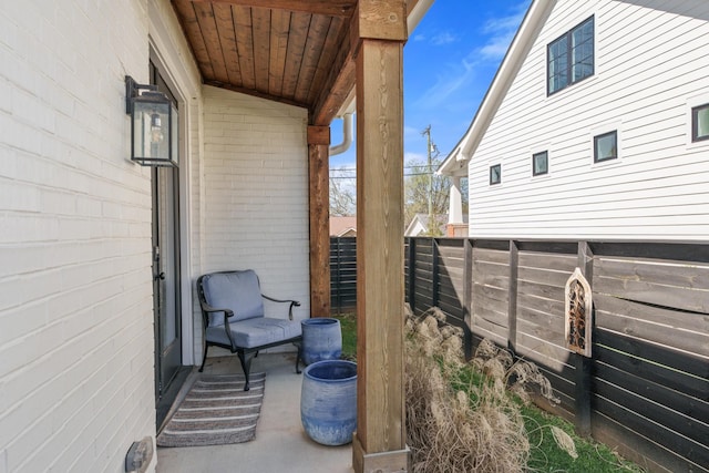 128 37th Ave N, Nashville, TN 37209 - view of home's exterior with fence and brick siding