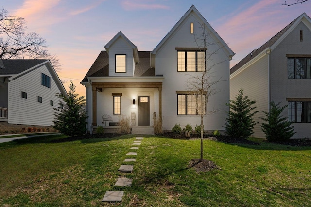 128 37th Ave N, Nashville, TN 37209 - view of front of home with a lawn and brick siding