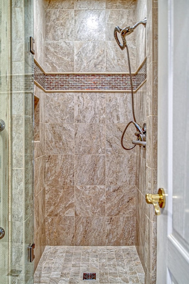 full bathroom with a shower stall