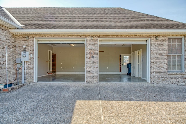 garage featuring driveway
