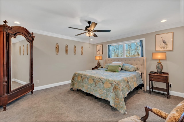 bedroom with baseboards, crown molding, and carpet floors