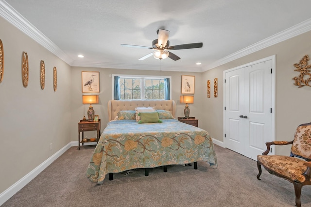 bedroom featuring baseboards, carpet flooring, ornamental molding, and a closet