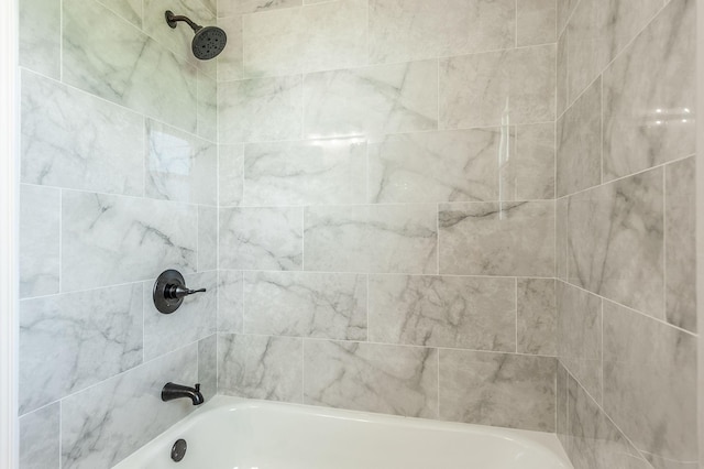 full bathroom featuring  shower combination