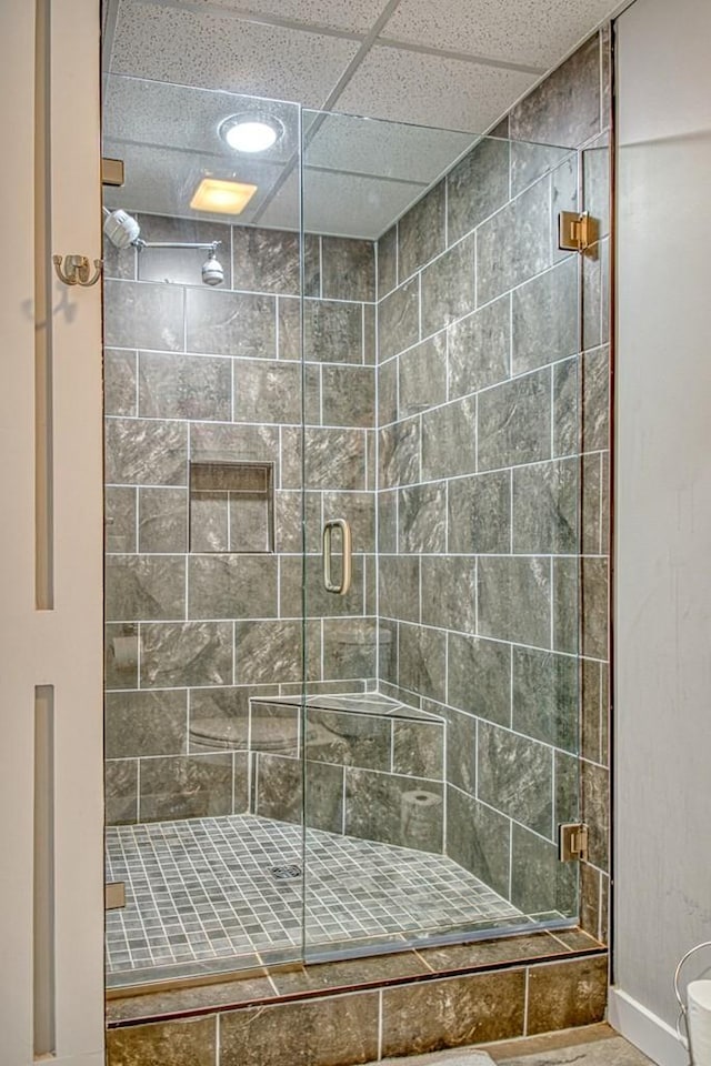full bath with a shower stall