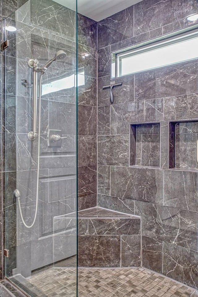 full bath featuring a walk in shower