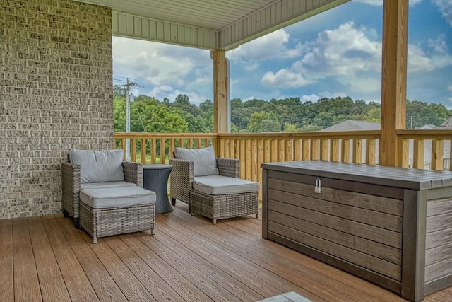 wooden terrace featuring outdoor lounge area