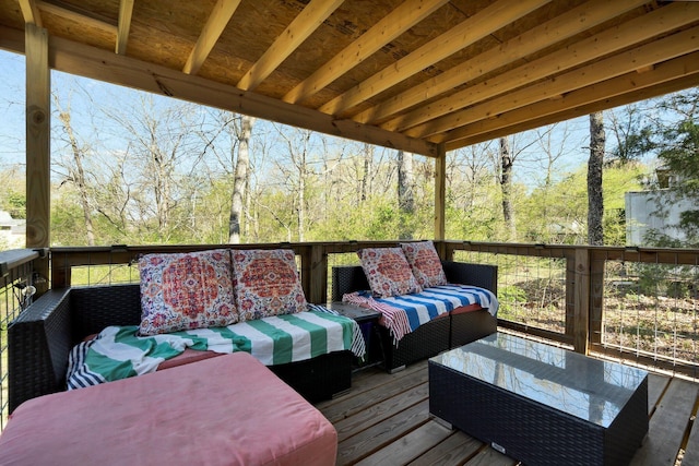 wooden terrace with outdoor lounge area
