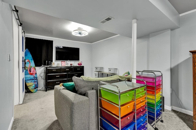 interior space with carpet flooring, crown molding, baseboards, and visible vents