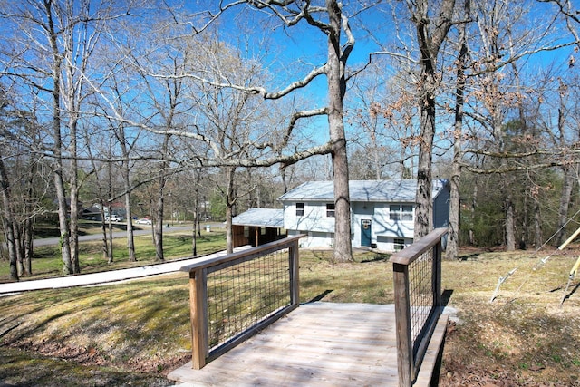 wooden deck with a yard
