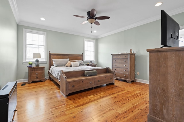 bedroom featuring ornamental molding, baseboards, light wood finished floors, and recessed lighting