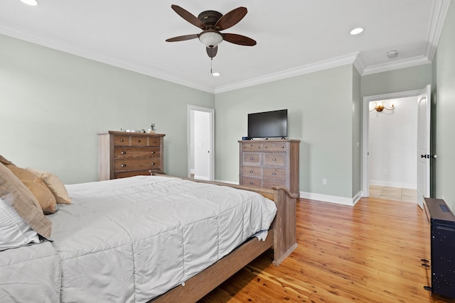 bedroom featuring baseboards, light wood-type flooring, recessed lighting, and ornamental molding