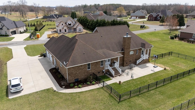 drone / aerial view with a residential view
