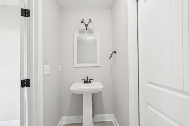 bathroom featuring baseboards