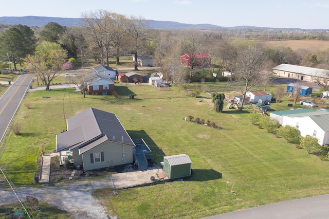 aerial view with a mountain view and a rural view