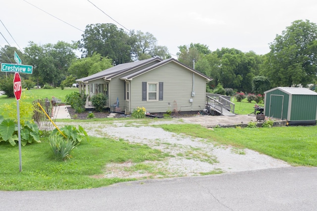 96 Liberty Rd, Winchester, TN 37398 - view of home's exterior featuring a shed and a lawn