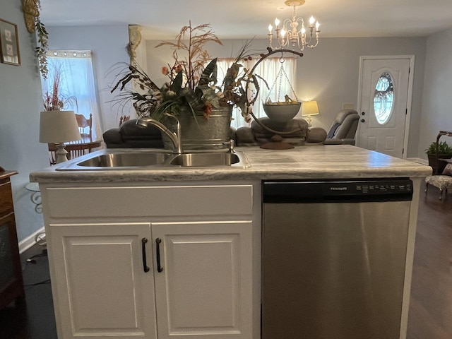 96 Liberty Rd, Winchester, TN 37398 - kitchen featuring stainless steel dishwasher, light countertops, a chandelier, and white cabinets