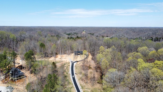 aerial view featuring a forest view