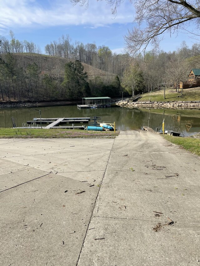 dock area featuring a water view